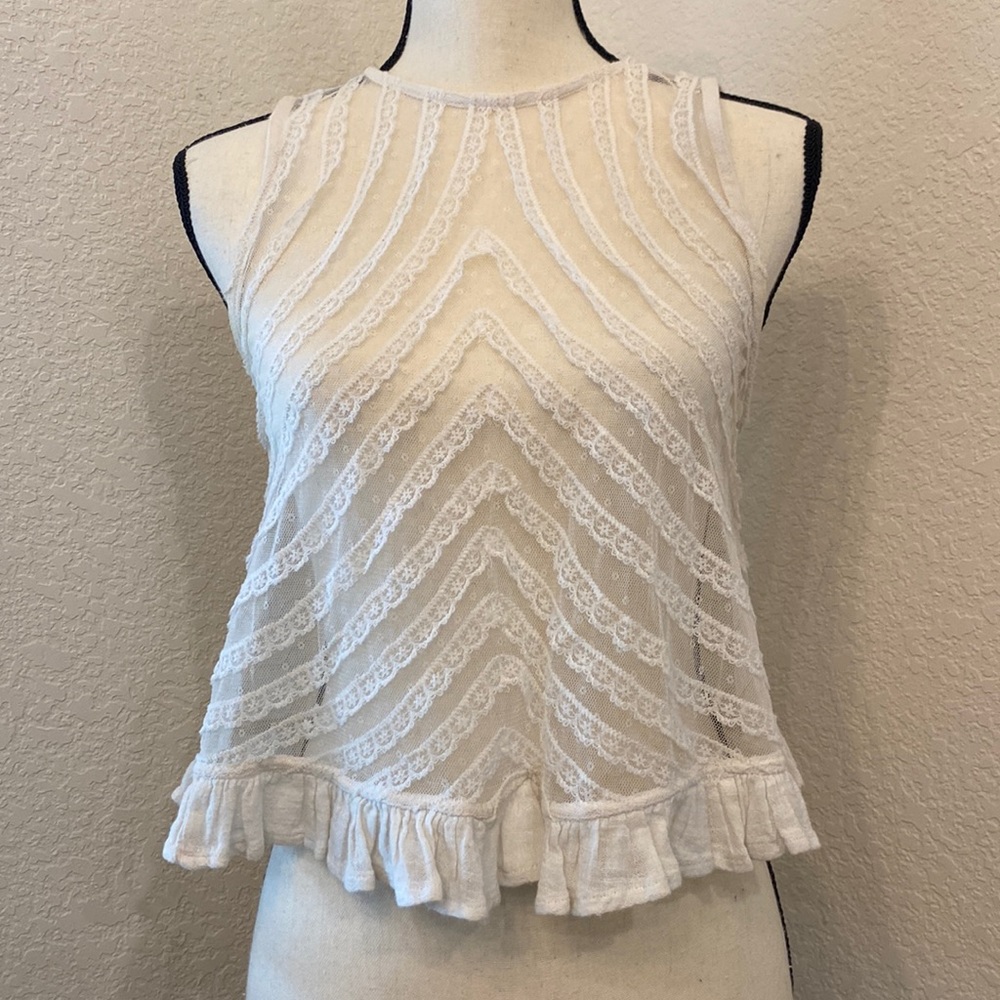 Free People She’s A Doll Lace Crop Top. Size XS. Color white.